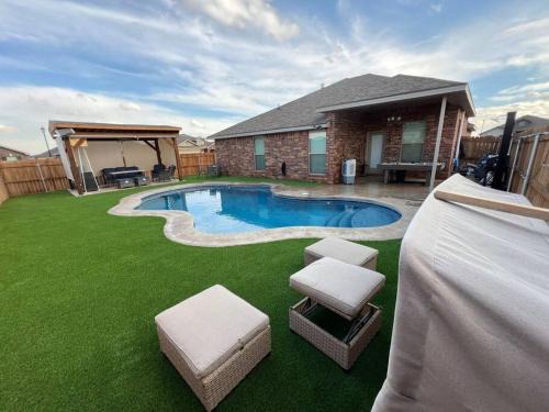 Midland House | Relax in Midland TX: Inviting House with Pool & Hot Tub