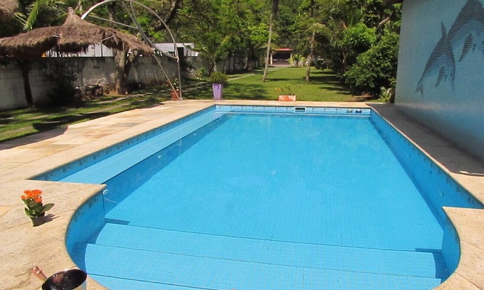 Recreio dos Bandeirantes House | Idyllic Retreat with Pool and Ocean Views for Small Events