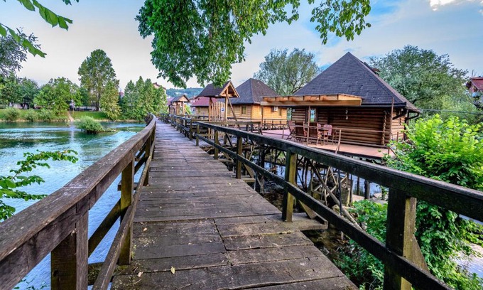Bosanska Krupa House | Idyllic House on Piles with Private Beach and River Views