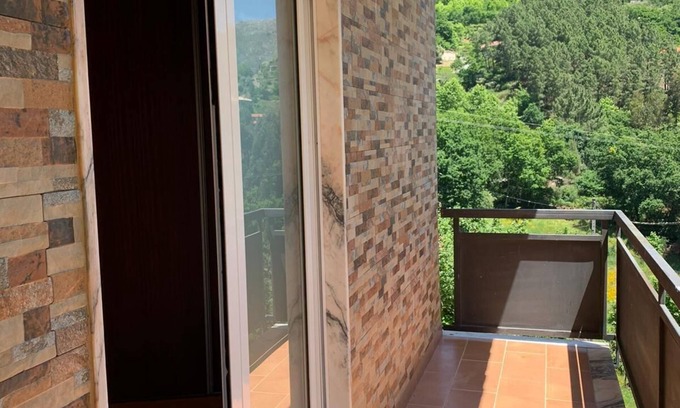 Cerva Apartment | Serene Retreat Overlooking the Valley with Prime Amenities