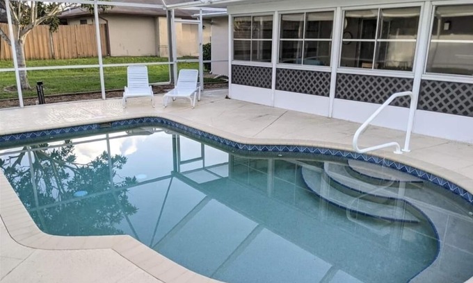 Port Charlotte House | Oceanfront House with Heated Pool & Spa, Rated 10/10