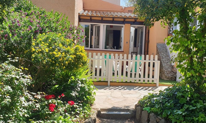La Fosca House | Cozy House with Garden, Steps from La Fosca Beach