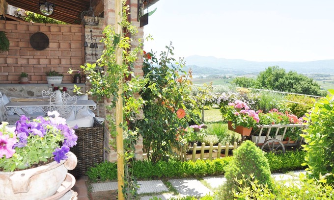 Castiglione del Lago Apartment | Tranquil House with Garden in Stone Farmhouse Retreat