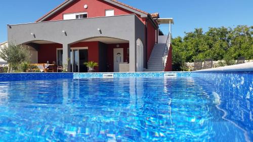 Povljana Apartment | Idyllic Blue Diamond House with Pool and Oceanfront Views