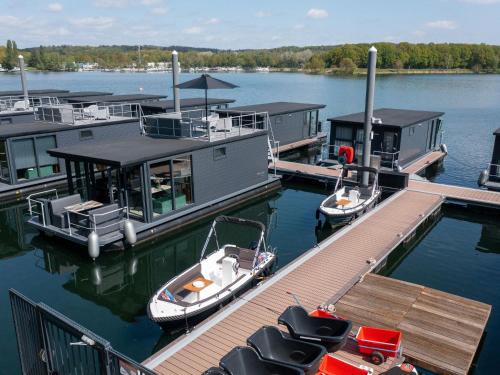 Middelaar Boat Rental | Tranquil Houseboat Escape with Rooftop Terrace & Family Fun