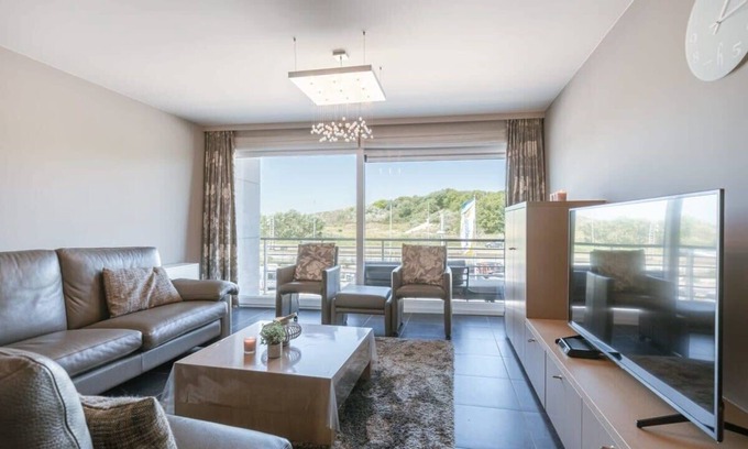 Bredene Apartment | Cozy Apartment with Parking Steps from the Beach