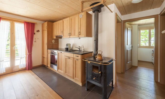 Axalp Apartment | Scenic Hygge Apartment with Ocean View and Pool Access