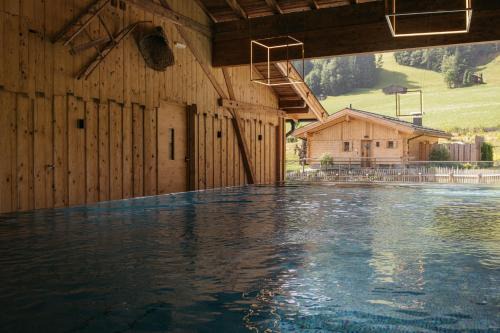 Reith im Alpbachtal Ski Chalet | Hygna Chalets: Oceanfront Retreat with Pool & Hot Tub