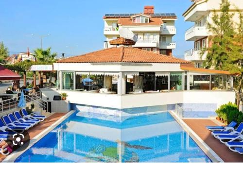 Side Apartment | Discover İrem Greenside Apart: Poolside Retreat Awaits