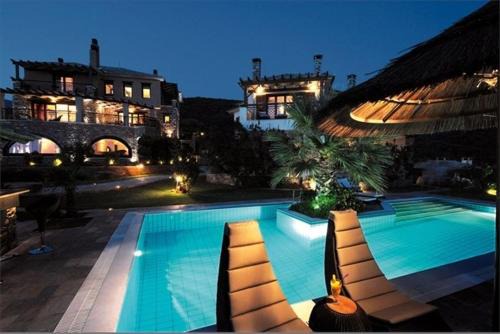 Koropi Hotel | Relax at Iakovakis Suites & Spa: 4-Star Comfort Awaits