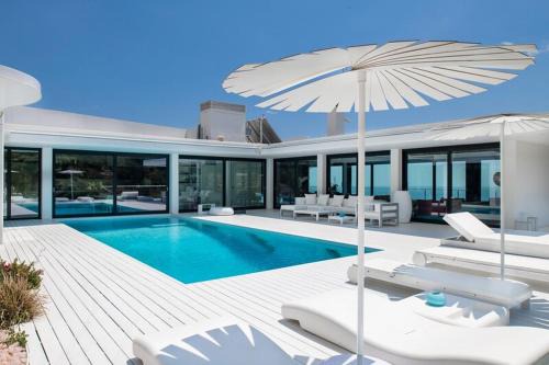 Mas Ram Villa | Experience Ibiza Style Barcelona with Pool and Family Amenities