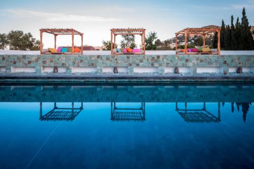 Santa Eulalia del Rio Hotel | Ibizazen: Relax by the Pool in a Family-Friendly Retreat