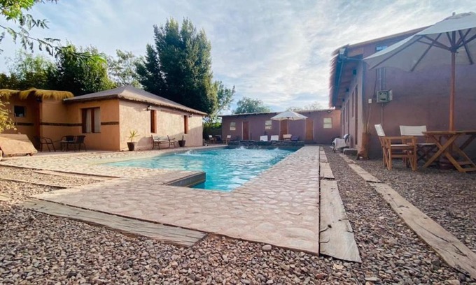 San Pedro de Atacama Bed & Breakfast | Inviting Ickota B&B: Pool and Kitchen with 9/10 Rating