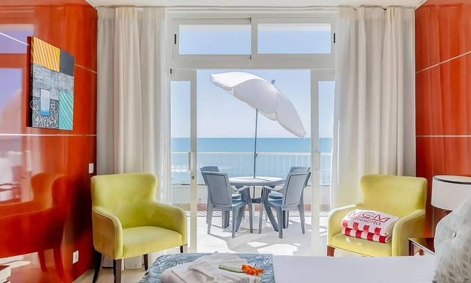 Oura Hotel | Perfect Tropical Escape: Beachfront Suites with Pools