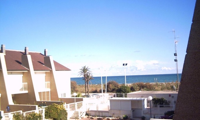 Playa de Almarda Apartment | Cozy Beachfront Retreat in Sagunto with Pool & Ocean Views