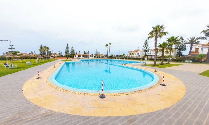 El Mansouria House | Your Family's Oasis: Private Beach & Pool Retreat