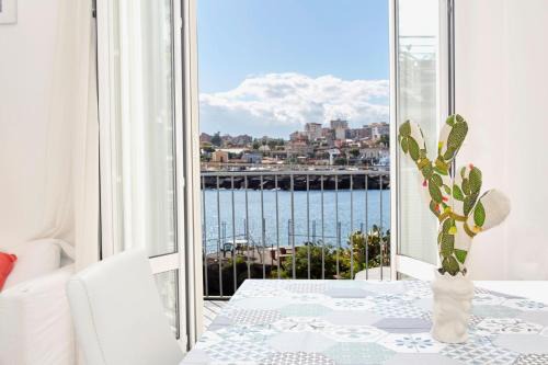 Picanello-Ognina-Barriera-Canalicchio Apartment | Pet-Friendly iDream Apartment & Rooms with Ocean View