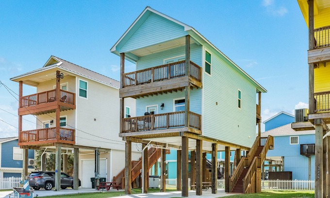 Galveston House | Beachfront Retreat with Balconies & Outdoor Shower Access