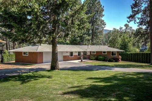 Post Falls House | Idyllic Riverside Vacation Retreat with Sandy Beach near Coeur d'Alene Idaho
