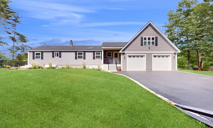 Manchester House | Bright Lakefront Home with Patio, Spa & Close to Skiing