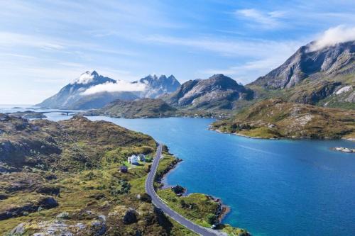 Flakstad House | Idyllic Oceanfront Retreats in Lofoten with Fireplace