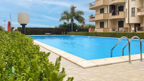 Gioiosa Ionica Apartment | Il Bergamotto: Relax by the Pool, Steps from the Beach