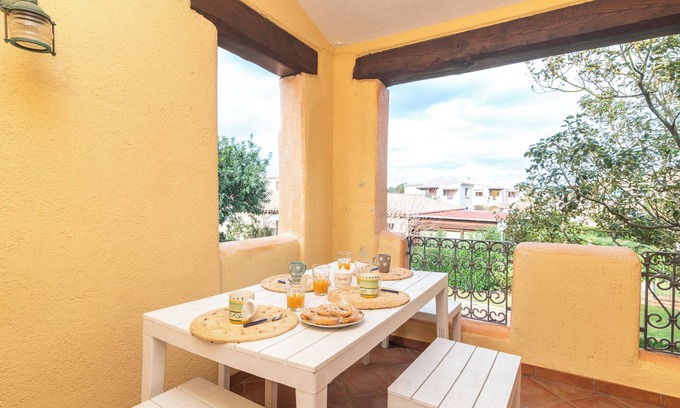 Porto San Paolo Apartment | Cozy Il Borgo: Steps from the Beach with Spa & Breakfast