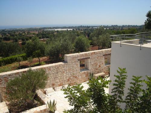 Polignano a Mare House | Discover Il Carrubo: Oceanfront Escape with Pool & Views