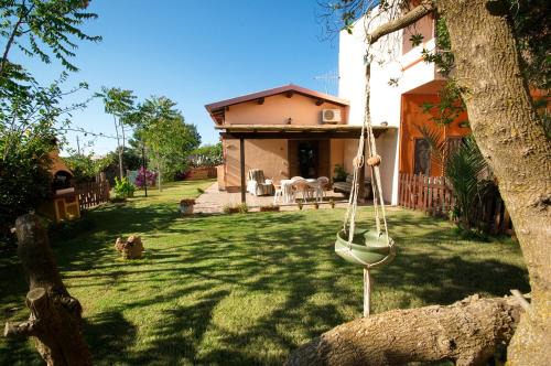 Masainas Apartment | Guest Rated 9.1: Experience Il Fenicottero Today
