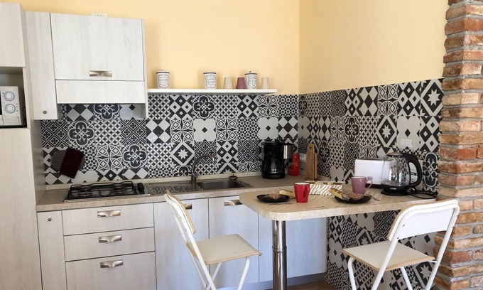 Prabione Apartment | Il Gelsomino - bright apartment with balcony and views of Mount Baldo