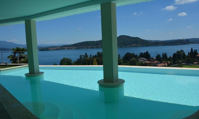 Meina Apartment | Discover Il Girasole: 4-Star Oceanfront Bliss