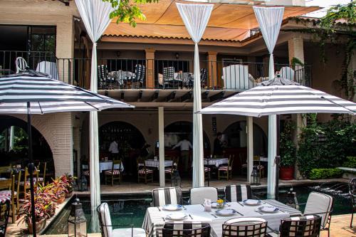 Acapantzingo Hotel | Experience Il Piccolo Peccato: Pet-Friendly Retreat with Pool