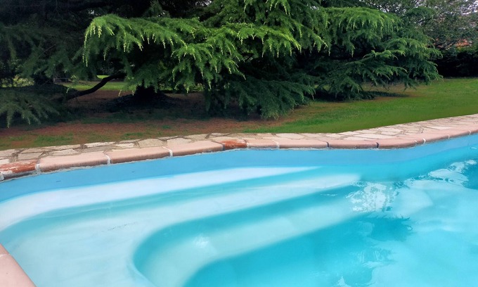 Roatto Apartment | Relax at Il Principe Rosso with Pool and Ocean Views