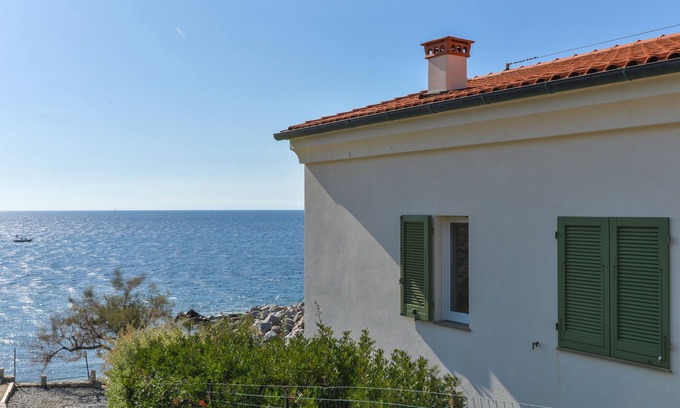 Campo nell'Elba Apartment | Scenic Il Quartiere Apartment Capraia with Ocean Views & Wi-Fi