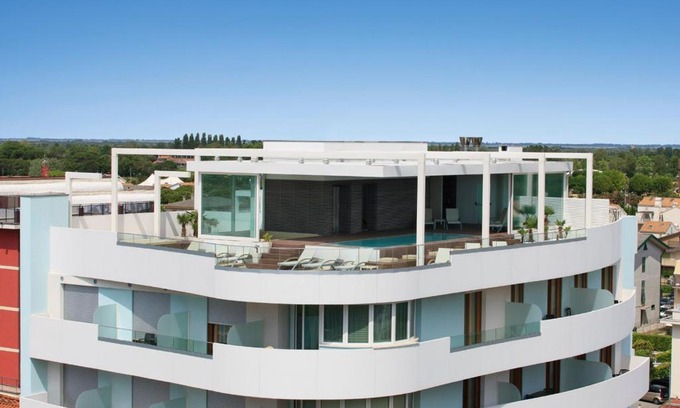 Lido di Jesolo Apartment | Discover Il Teatro: Oceanfront Oasis with Private Beach