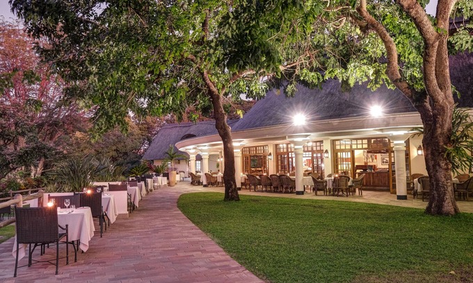 Victoria Falls Hotel | Discover Ilala Lodge Hotel: 4-Star Retreat with Pool & Spa