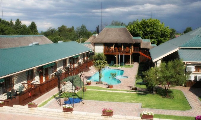 Ficksburg House | Inviting Imperani Guesthouse with Pool and Hot Tub Access