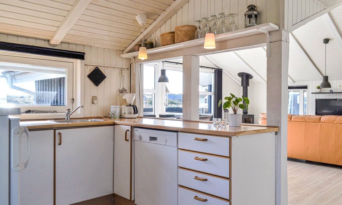 Bjerregard Strand House | Cozy Oceanfront Retreat in Scenic Bjerregård Awaits You