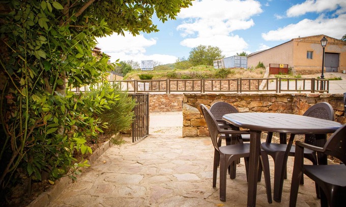 Horcajuelo de la Sierra Ski Chalet | Relax at Maillo House: Patio, Terrace & Pet-Friendly Stay