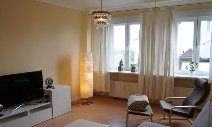 Hohenfelde Apartment | City Center Haven: Top Floor Apartment with Family Amenities