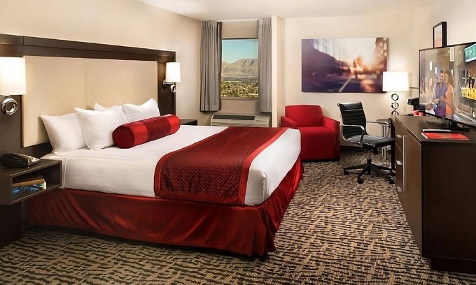 Gateway District Hotel | Central Vegas Escape: Casino, Pools & Game Room Awaits!