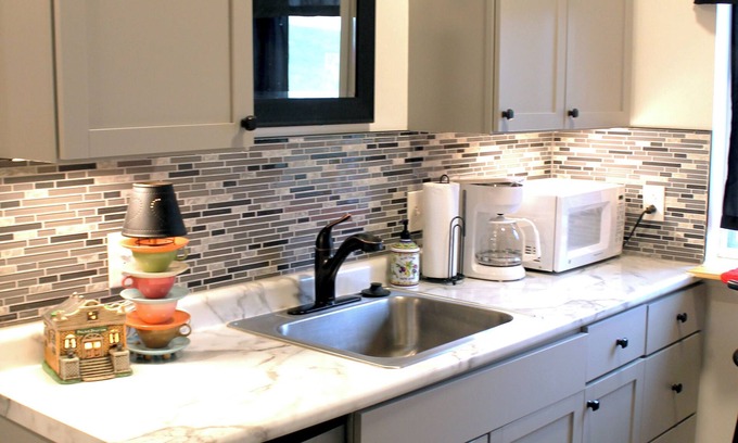 St. George House | In the Woods: One-of-a-Kind Stay - Renovated Garage Featuring Antique Cars