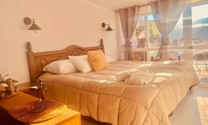 De Guadalupe Apartment | Stylish Loft with Terrace and Scenic Views for Families