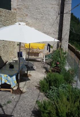 Serra San Quirico House | Charming Incontro: Where Daylight Fades into Night
