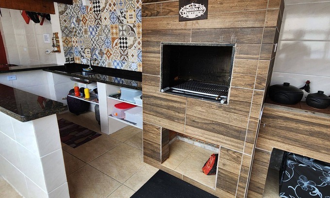 Jardim Praia Grande House | Inviting Retreat with Pool and Wi-Fi in Mongaguá/SP