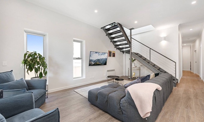 Fitzroy Apartment | Delightful Balcony Duplex in Fitzroy with Family Amenities