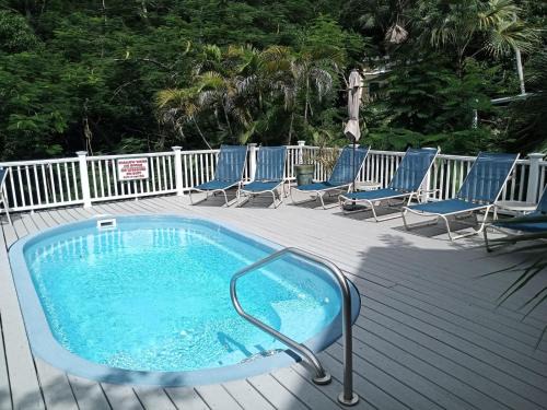 Estate Enighed Apartment | Indigo: Pet-Friendly Retreat with Pool and Family Fun