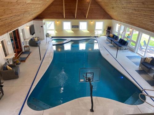 Muskegon House | Relaxing Indoor Pool Steps from Grand Haven & Lake Michigan