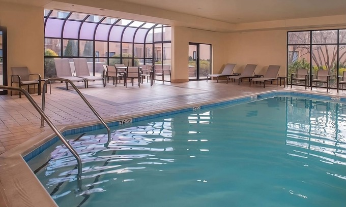 Columbia Hotel | Experience Homely Comfort Near Lake Kittamaqundi with Pool