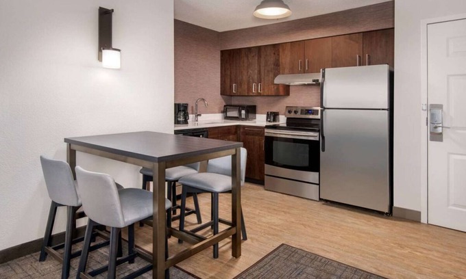 Town Center Hotel | Experience Cozy Comfort with Free Breakfast & Pool Access